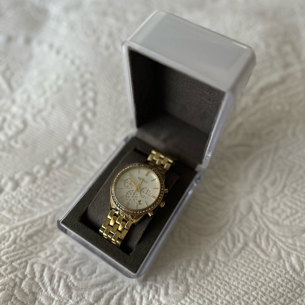 Gold DKNY Watch with Crystal Accents & Mother of Pearl face
